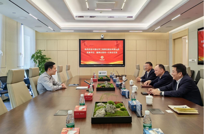 周鴻拜訪中國紙業黨委書記、董事長、總經理鐘天崎