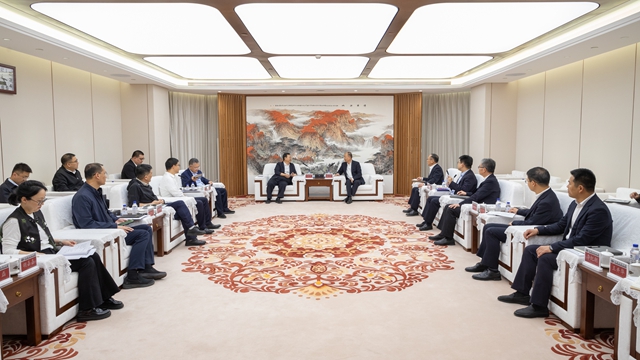 莫鼎革與北京市東城區(qū)委書(shū)記孫新軍舉行會(huì)談